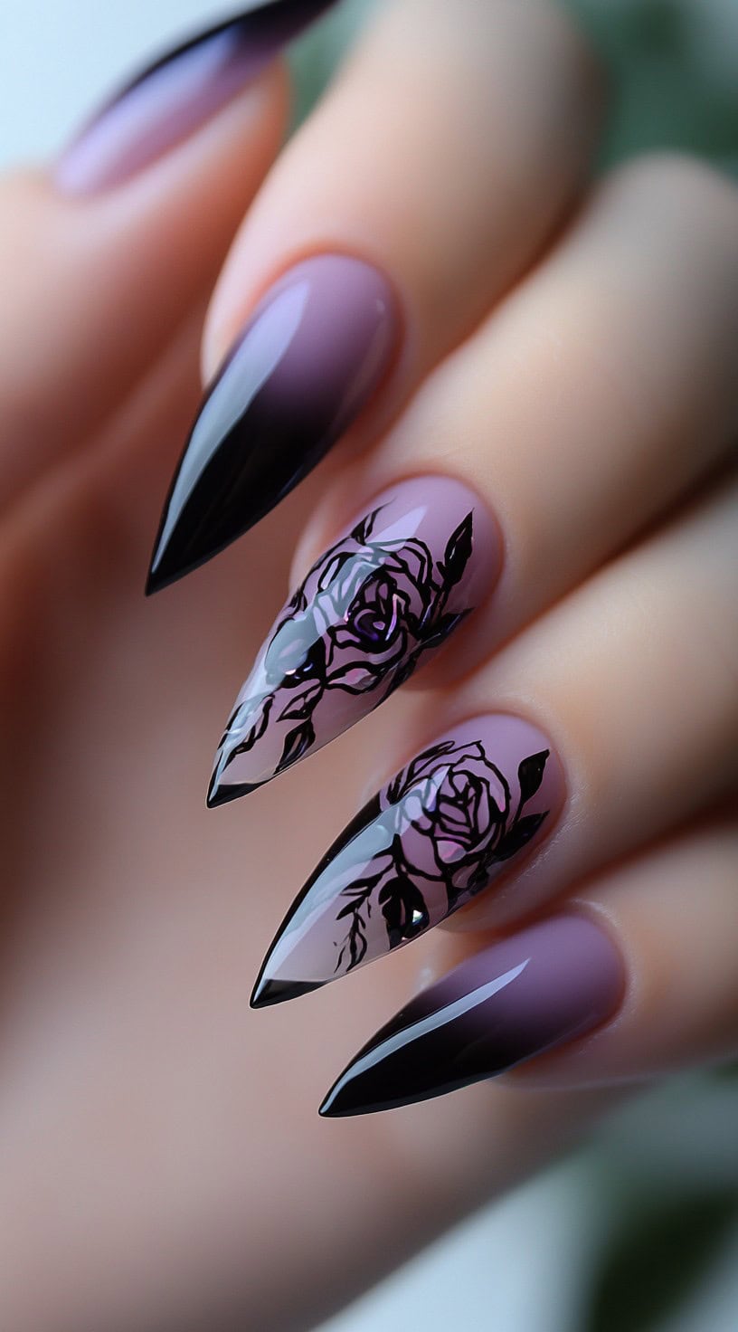 Almond-shaped ombré nails with purple fading into black and delicate black rose art on a few accent nails.