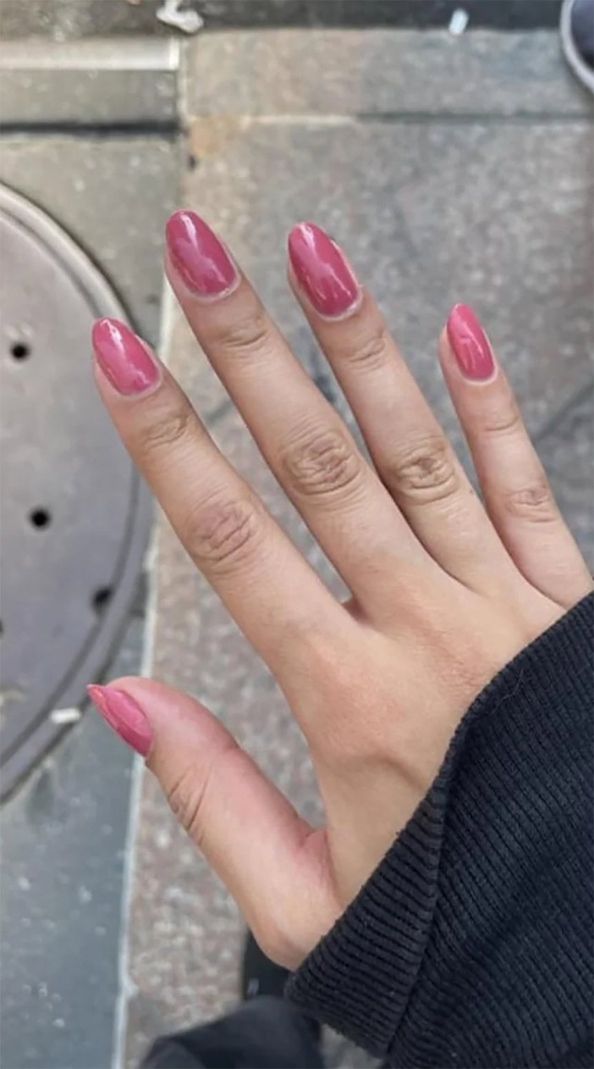 Soft pink oval nails on wide nail beds, offering a balanced and elongating look without sharp edges.