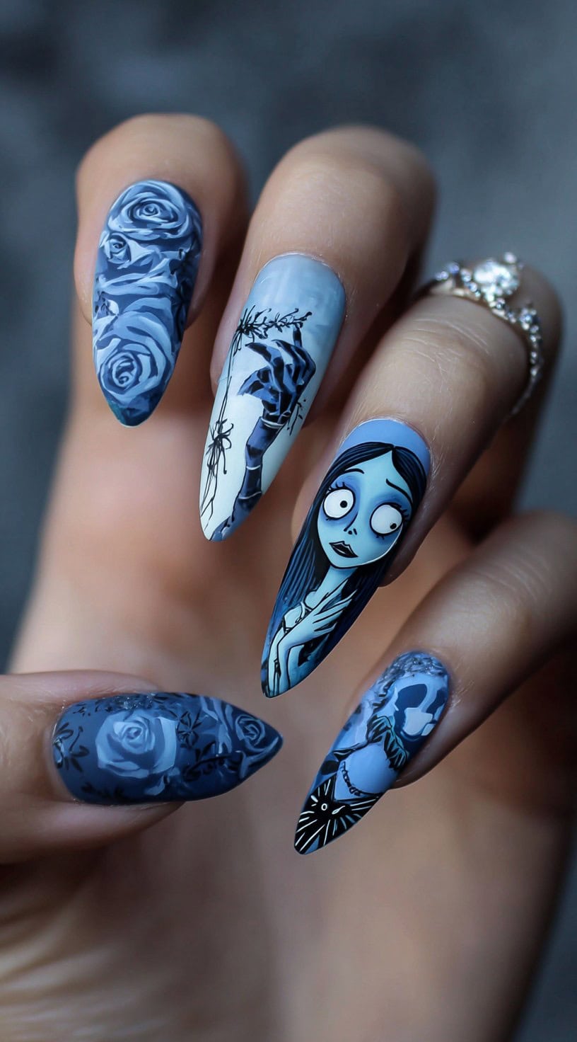 Long almond nails featuring hand-painted blue roses, skeletal details, and a striking portrait of the haunted bride.
