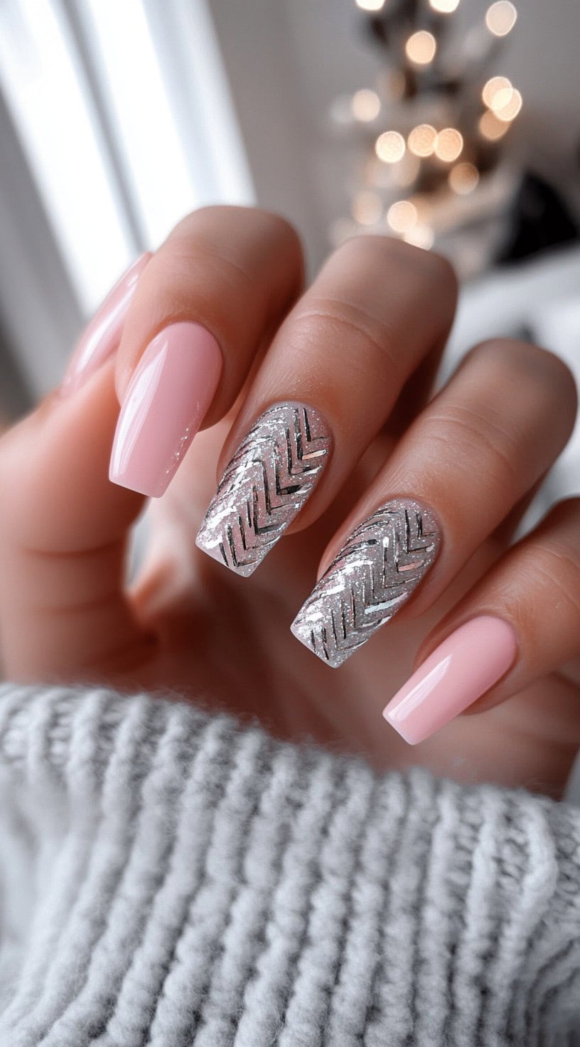 Long coffin nails with pink polish and chevron glitter accents.
