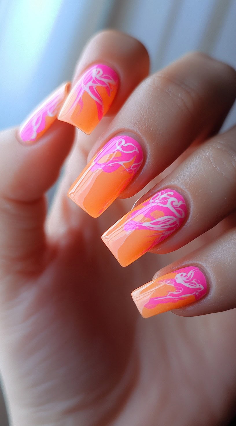 Square nails with a vertical pink-to-orange ombré base and tribal-style hot pink abstract line art