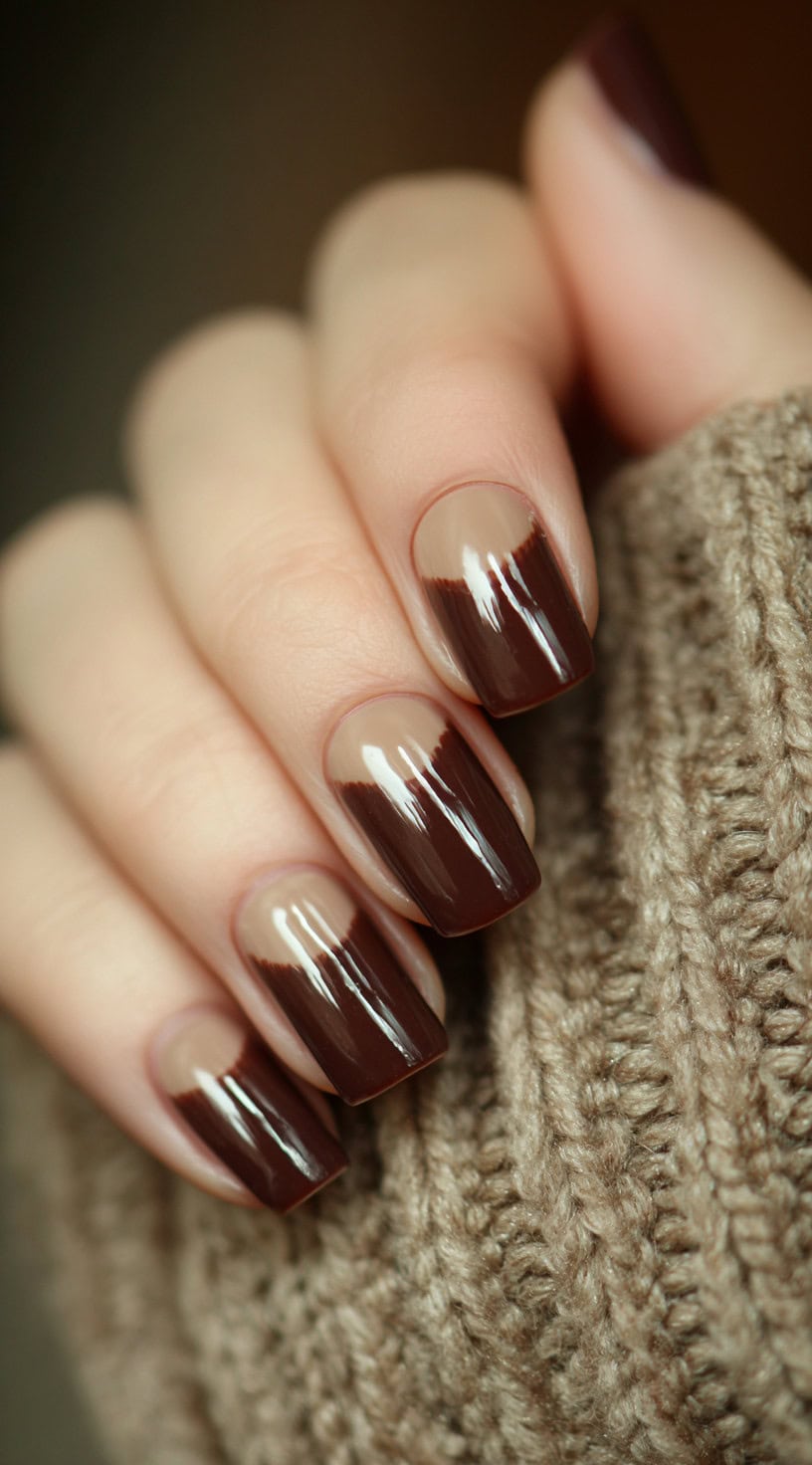Square nails with a glossy chocolate brown tip covering the lower half of the nail, leaving the upper half sheer.